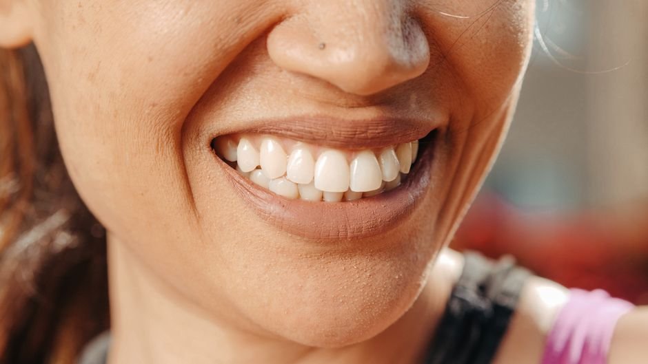 Close-up of a woman's natural, healthy smile